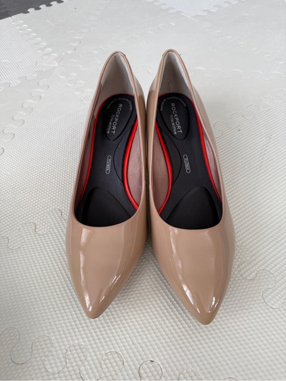 Brand new, never worn Rockport Patent Pointed-Toe Pumps in Nude